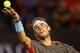 MELBOURNE, AUSTRALIA - JANUARY 18: Rafael Nadal of Spain serves in his third round match against Gael Monfils of France during day six of the 2014 Australian Open at Melbourne Park on January 18, 2014 in Melbourne, Australia. (Photo by Cameron Spencer/Ge