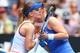 MELBOURNE, AUSTRALIA - JANUARY 18: Anastasia Pavlyuchenkova of Russia congratulates Agnieszka Radwanska of Poland on winning her third round during day six of the 2014 Australian Open at Melbourne Park on January 18, 2014 in Melbourne, Australia. (Photo