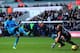 SWANSEA, WALES - JANUARY 19: Spurs player Emmanuel Adebayor rolls in the third goal during the Barclays premier league match between Swansea City and Tottenham Hotspur at Liberty Stadium on January 19, 2014 in Swansea, Wales. (Photo by Stu Forster/Getty