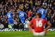 LONDON, ENGLAND - JANUARY 19: Samuel Eto'o #29 of Chelsea celebrates with teammate Cesar Azpilicueta #28 after scoring the opening goal during the Barclays Premier League match between Chelsea and Manchester United at Stamford Bridge on January 19, 2014