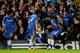 LONDON, ENGLAND - JANUARY 19: Samuel Eto'o (R) of Chelsea celebrates with teammates David Luiz (C) and Willian (L) after scoring his team's second goal during the Barclays Premier League match between Chelsea and Manchester United at Stamford Bridge on J