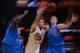 December 11, 2013; Oakland, CA, USA; Golden State Warriors point guard Stephen Curry (30) passes the ball against Dallas Mavericks power forward Dirk Nowitzki (41) during the third quarter at Oracle Arena. The Warriors defeated the Mavericks 95-93. Mandat
