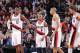 PORTLAND, OR - DECEMBER 12: LaMarcus Aldridge #12, Damian Lillard #0 and Nicolas Batum #88 of the Portland Trail Blazers stand on the court against the Houston Rockets on December 12, 2013 at the Moda Center Arena in Portland, Oregon. NOTE TO USER: User