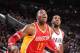 PORTLAND, OR - DECEMBER 12: Dwight Howard #12 of the Houston Rockets boxes out LaMarcus Aldridge #12 of the Portland Trail Blazers on December 12, 2013 at the Moda Center Arena in Portland, Oregon. NOTE TO USER: User expressly acknowledges and agrees tha