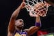 Jan 15, 2014; Phoenix, AZ, USA; Los Angeles Lakers guard Jodie Meeks (20) dunks the ball against the Phoenix Suns in the first half at US Airways Center. The Suns won 121-114. Mandatory Credit: Jennifer Stewart-USA TODAY Sports