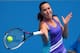 MELBOURNE, AUSTRALIA - JANUARY 18: Jelena Jankovic of Serbia plays a forehand in her third round match against Kurumi Nara of Japan during day six of the 2014 Australian Open at Melbourne Park on January 18, 2014 in Melbourne, Australia. (Photo by Quinn