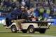 Jan 19, 2014; Seattle, WA, USA; San Francisco 49ers inside linebacker NaVorro Bowman (53) is carted off the field after an injury against the Seattle Seahawks during the second half of the 2013 NFC Championship football game at CenturyLink Field. Mandator