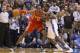 OKLAHOMA CITY, OK - DECEMBER 29 : Dwight Howard #12 of the Houston Rockets handles the ball against Kendrick Perkins #5 of the Oklahoma City Thunder at the Chesapeake Arena on December 29, 2013 in Oklahoma City, Oklahoma. NOTE TO USER: User expressly ac