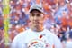 DENVER, CO - JANUARY 19: Peyton Manning #18 of the Denver Broncos celebrates after they defeated the New England Patriots 26 to 16 during the AFC Championship game at Sports Authority Field at Mile High on January 19, 2014 in Denver, Colorado. (Photo by
