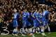 Jubilant Chelsea players celebrate a goal during their win over Manchester United.