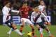 ROME, ITALY - NOVEMBER 25: Daniele Conti and Sebastian Eriksson (R) of Cagliari Calcio compete for the ball with Miralem Pjanic (C) of AS Roma during the Serie A match AS Roma and Cagliari Calcio at Stadio Olimpico on November 25, 2013 in Rome, Italy. (
