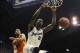 Jan 18, 2014; Lawrence, KS, USA; Kansas Jayhawks center Joel Embiid (21) dunks the ball against Oklahoma State Cowboys guard Markel Brown (22) in the second half at Allen Fieldhouse. Kansas won 80-78. Mandatory Credit: John Rieger-USA TODAY Sports