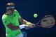 MELBOURNE, AUSTRALIA - JANUARY 19: David Ferrer of Spain plays a backhand in his fourth round match against Florian Mayer of Germany during day seven of the 2014 Australian Open at Melbourne Park on January 19, 2014 in Melbourne, Australia. (Photo by Cl