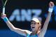 MELBOURNE, AUSTRALIA - JANUARY 19: Ana Ivanovic of Serbia celebrates winning her fourth round match against Serena Williams of the United States during day seven of the 2014 Australian Open at Melbourne Park on January 19, 2014 in Melbourne, Australia.