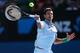 MELBOURNE, AUSTRALIA - JANUARY 19: Novak Djokovic of Serbia plays a forehand in his fourth round match against Fabio Fognini of Italy during day seven of the 2014 Australian Open at Melbourne Park on January 19, 2014 in Melbourne, Australia. (Photo by Q
