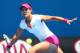 MELBOURNE, AUSTRALIA - JANUARY 19: Na Li of China plays a forehand in her fourth round match against Ekaterina Makarova of Russia during day seven of the 2014 Australian Open at Melbourne Park on January 19, 2014 in Melbourne, Australia. (Photo by Ryan