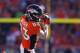 DENVER, CO - JANUARY 19: Wes Welker #83 of the Denver Broncos completes a reception in the first quarter against the New England Patriots during the AFC Championship game at Sports Authority Field at Mile High on January 19, 2014 in Denver, Colorado. (