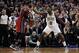 Mar 18, 2013; Boston, Massachusetts, USA; Miami Heat forward LeBron James (6) is guarded by Boston Celtics forward Jeff Green (8) during the fourth quarter at TD Banknorth Garden. The Miami Heat won 105-103. Mandatory Credit: Greg M. Cooper-USA TODAY Sp
