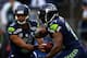 SEATTLE, WA - SEPTEMBER 15: Russell Wilson #3 of the Seattle Seahawks hands the ball off turnover Marshawn Lynch #24 of the Seattle Seahawks during their game at Qwest Field on September 15, 2013 in Seattle, Washington. (Photo by Jonathan Ferrey/Getty