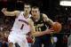 Jan 18, 2014; Madison, WI, USA; Michigan Wolverines guard Nik Stauskas (11) looks to shoot as Wisconsin Badgers guard Ben Brust (1) defends during the first half at the Kohl Center. Mandatory Credit: Mary Langenfeld-USA TODAY Sports