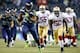 SEATTLE, WA - JANUARY 19: Running back Marshawn Lynch #24 of the Seattle Seahawks runs for a 40-yard touchdown in the third quarter against the San Francisco 49ers during the 2014 NFC Championship at CenturyLink Field on January 19, 2014 in Seattle, Wash