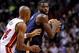Jan 7, 2014; Miami, FL, USA; New Orleans Pelicans point guard Tyreke Evans (1) looks to pass the ball as Miami Heat shooting guard Ray Allen (34) defends during the second half at American Airlines Arena. The Heat won 107-88. Mandatory Credit: Steve Mitch