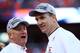 DENVER, CO - JANUARY 19: Peyton Manning #18 and head coach John Fox of the Denver Broncos celebrate after they defeated the New England Patriots 26 to 16 in the AFC Championship game at Sports Authority Field at Mile High on January 19, 2014 in Denver, C