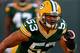 GREEN BAY, WI - AUGUST 09: Nick Perry #53 of the Green Bay Packers participates in warm-ups before a game against the Arizona Cardinals at Lambeau Field on August 9, 2013 in Green Bay, Wisconsin. The Cardinals defeated the Packers 17-0. (Photo by Jonath