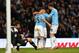 MANCHESTER, ENGLAND - JANUARY 18: Sergio Aguero of Manchester City celebrates with teammates Jesus Navas (L) and Edin Dzeko (R) after scoring his team's fourth goal during the Barclays Premier League match between Manchester City and Cardiff City at the