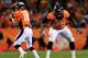 DENVER, CO - SEPTEMBER 23: Chris Clark #75 protects Peyton Manning #18 of the Denver Broncos in the second quarter against the Oakland Raiders at Sports Authority Field at Mile High on September 23, 2013 in Denver, Colorado. (Photo by Doug Pensinger/G