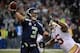 Jan 19, 2014; Seattle, WA, USA; Seattle Seahawks quarterback Russell Wilson (3) passes the ball against San Francisco 49ers outside linebacker Ahmad Brooks (55) during the first half of the 2013 NFC Championship football game at CenturyLink Field. Mandato