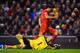LIVERPOOL, ENGLAND - JANUARY 18: Luis Suarez of Liverpool goes to ground after a challenge by Brad Guzan of Aston Villa leading to a penalty during the Barclays Premier League match between Liverpool and Aston Villa at Anfield on January 18, 2014 in Live