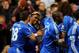 LONDON, ENGLAND - JANUARY 19: Samuel Eto'o (2nd L) of Chelsea celebrates with teammates after scoring his team's third goal and completing his hat trick during the Barclays Premier League match between Chelsea and Manchester United at Stamford Bridge on