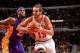CHICAGO, IL - JANUARY 20: Joakim Noah #13 of the Chicago Bulls goes to the basket past Jordan Hill #27 of the Los Angeles Lakers on January 20, 2014 at the United Center in Chicago, Illinois. NOTE TO USER: User expressly acknowledges and agrees that, by d