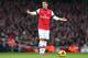 LONDON, ENGLAND - JANUARY 18: Mesut Ozil of Arsenal in action during the Barclays Premier League match between Arsenal and Fulham at Emirates Stadium on January 18, 2014 in London, England. (Photo by Clive Mason/Getty Images)