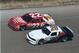 Davey (No. 28) races side-by-side with his father Bobby (No. 22) at Daytona in 1987.