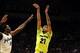 Jan 20, 2014; Lawrence, KS, USA; Baylor Bears center Isaiah Austin (21) shoots as Kansas Jayhawks center Joel Embiid (21) defends during the first half at Allen Fieldhouse. Mandatory Credit: Denny Medley-USA TODAY Sports