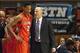 Jan 18, 2014; Champaign, IL, USA; Illinois Fighting Illini head coach John Groce talks with Illinois Fighting Illini guard Joseph Bertrand (2) on the sideline during the second half of the game against the Michigan State Spartans at State Farm Center. The