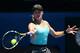 MELBOURNE, AUSTRALIA - JANUARY 21: Eugenie Bouchard of Canada plays a backhand in her quarterfinal match against Ana Ivanovic of Serbia during day nine of the 2014 Australian Open at Melbourne Park on January 21, 2014 in Melbourne, Australia. (Photo by