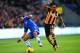 HULL, ENGLAND - JANUARY 11: Ashley Cole of Chelsea and Ahmed Elmohamady of Hull City battle for the ball during the Barclays Premier League match between Hull City and Chelsea at KC Stadium on January 11, 2014 in Hull, England. (Photo by Laurence Griffi