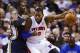 Jan 17, 2014; Auburn Hills, MI, USA; Detroit Pistons power forward Greg Monroe (10) is defended by Utah Jazz small forward Jeremy Evans (40) in the first half at The Palace of Auburn Hills. Utah won 110-89. Mandatory Credit: Rick Osentoski-USA TODAY Sport