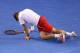 MELBOURNE, AUSTRALIA - JANUARY 21: Stanislas Wawrinka of Switzerland slips over in his quarterfinal match against Novak Djokovic of Serbia during the 2014 Australian Open at Melbourne Park on January 21, 2014 in Melbourne, Australia. (Photo by Quinn Roo