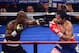 Jun. 9, 2012; Las Vegas, NV, USA; Timothy Bradley Jr (left) against Manny Pacquiao during a welterweight championship bout at the MGM Grand Garden Arena. Mandatory Credit: Mark J. Rebilas-USA TODAY Sports