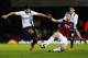 LONDON, ENGLAND - JANUARY 21: Sergio Aguero of Manchester City is tackled by Kevin Nolan of West Ham United during the Capital One Cup Semi-Final, Second Leg match between West Ham United and Manchester City at Boleyn Ground on January 21, 2014 in London