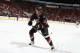 Eric Staal skates in front of a sparse that snowy night in 2010.