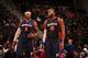 AUBURN HILLS, MI - NOVEMBER 3: Josh Smith #6 talks to Greg Monroe #10 of the Detroit Pistons against the Boston Celtics during the game on November 3, 2013 at The Palace of Auburn Hills in Auburn Hills, Michigan. NOTE TO USER: User expressly acknowledges