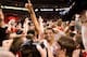 Nebraska celebrated its first Big Ten win by storming the court.