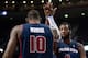 Jan 5, 2014; Auburn Hills, MI, USA; Detroit Pistons center Andre Drummond (0) high fives power forward Greg Monroe (10) during the first quarter against the Memphis Grizzlies at The Palace of Auburn Hills. Mandatory Credit: Tim Fuller-USA TODAY Sports
