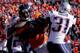 DENVER, CO - JANUARY 19: Julius Thomas #80 of the Denver Broncos makes a catch as he gets tackled by Kyle Arrington #25 and Aqib Talib #31 of the New England Patriots during the AFC Championship game at Sports Authority Field at Mile High on January 19,