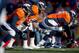 DENVER, CO - DECEMBER 8: The Denver Broncos offensive line lines up with Manny Ramirez #66 at center against the Tennessee Titans at Sports Authority Field Field at Mile High on December 8, 2013 in Denver, Colorado. (Photo by Dustin Bradford/Getty Image